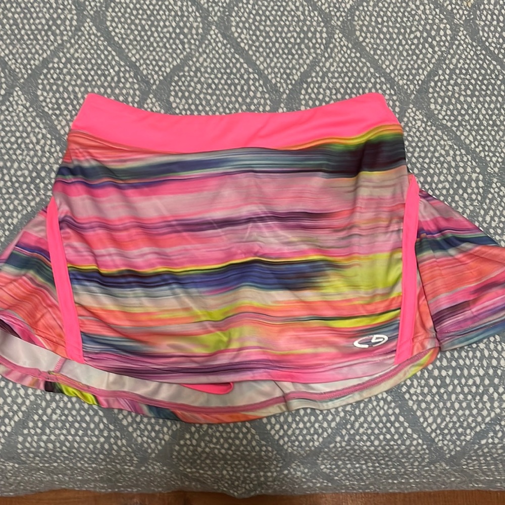 Champion tennis skirt, size XL (14-16). Built in shorts.